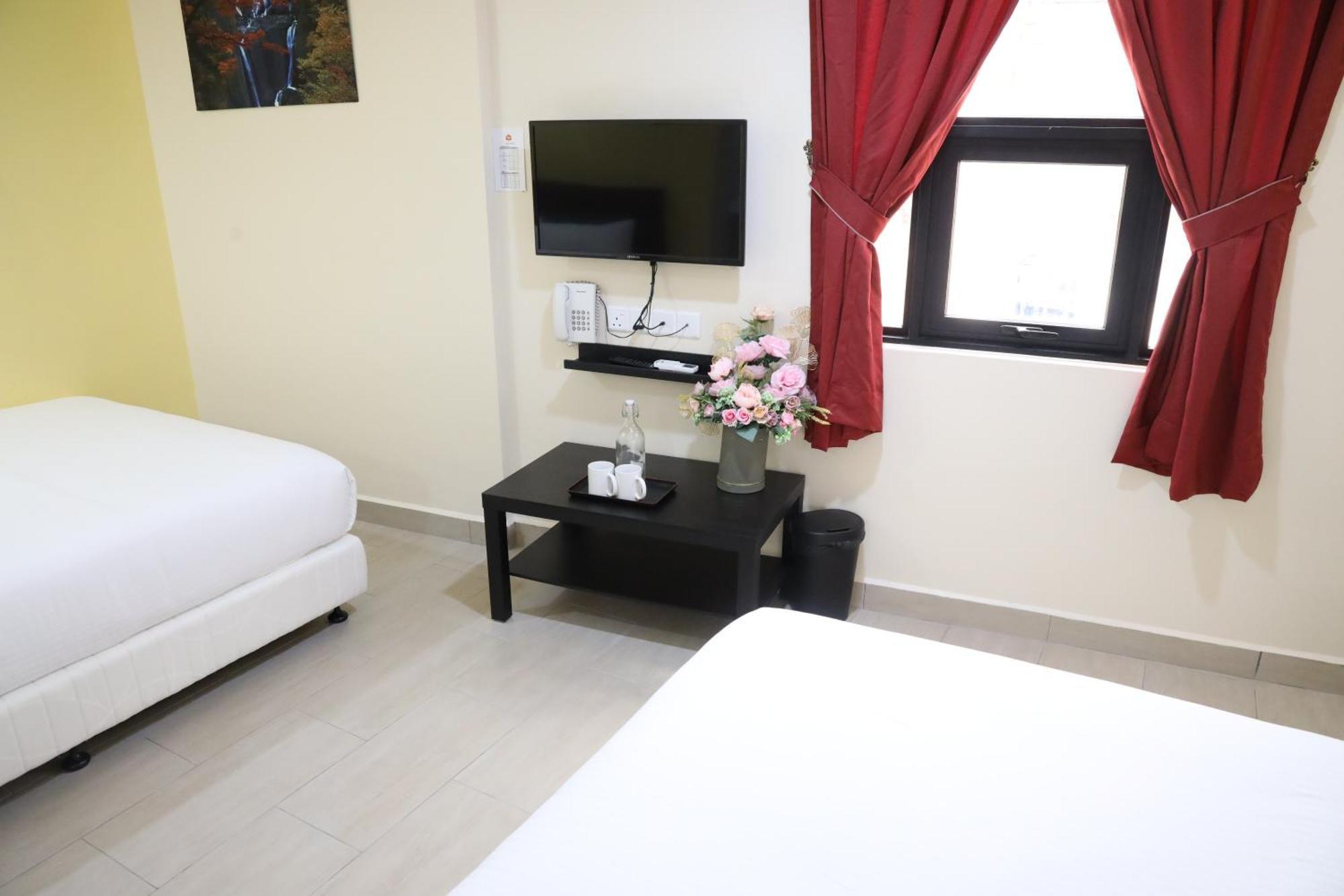 Capital O 90897 Island City Hotel Джорджтаун Экстерьер фото
