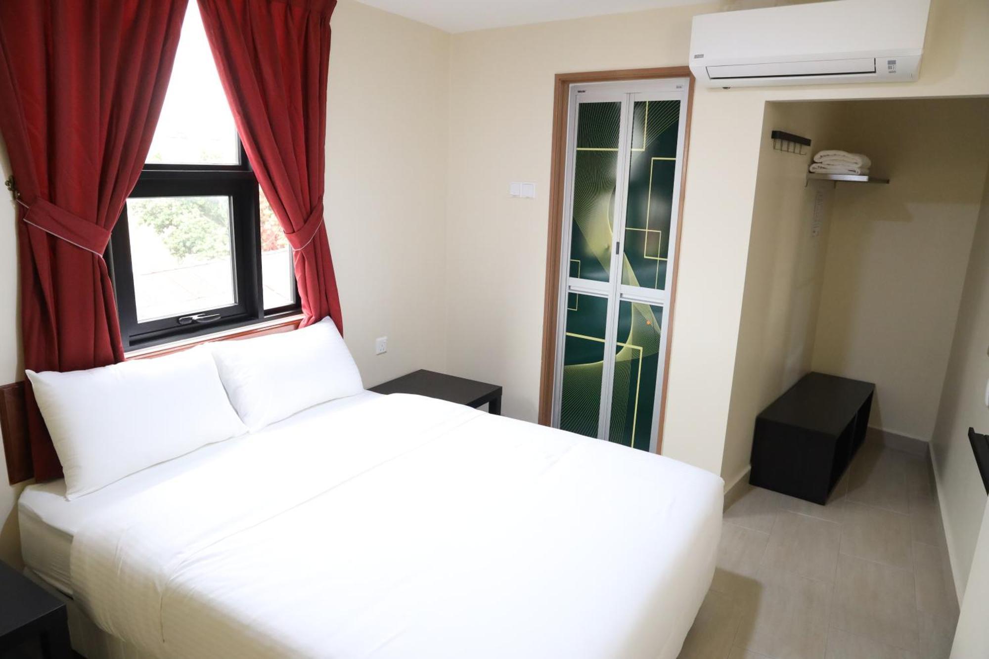 Capital O 90897 Island City Hotel Джорджтаун Экстерьер фото