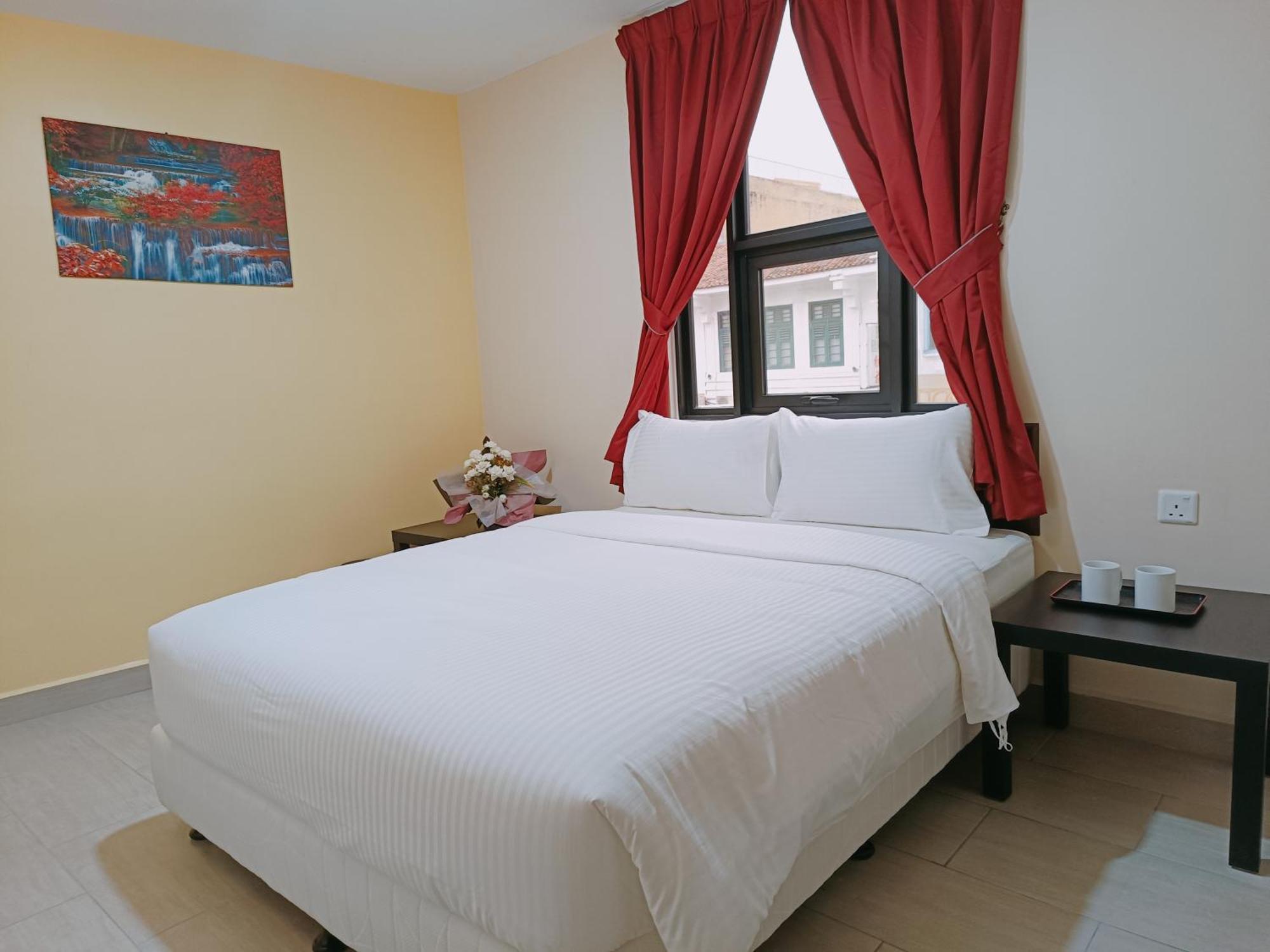 Capital O 90897 Island City Hotel Джорджтаун Экстерьер фото