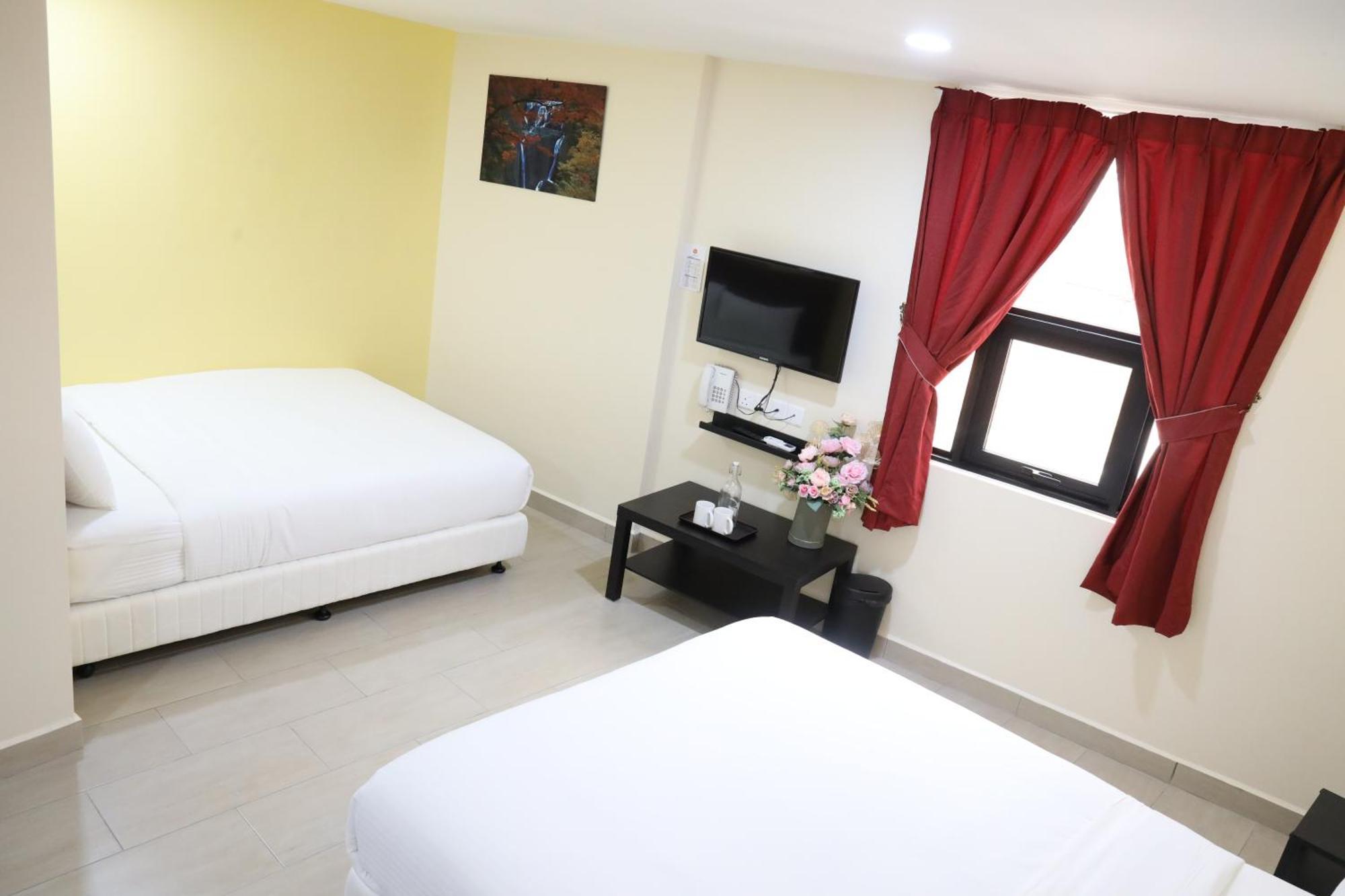 Capital O 90897 Island City Hotel Джорджтаун Экстерьер фото